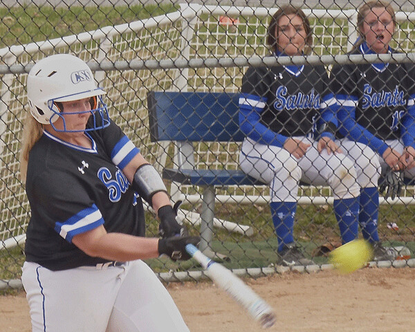 St. Scholastica's Marjaana Dailey lined a leadoff double in the fifth inning that led to the clinching rally against Martin Luther for the Saints ninth straight victory. Photo Credit: John Gilbert