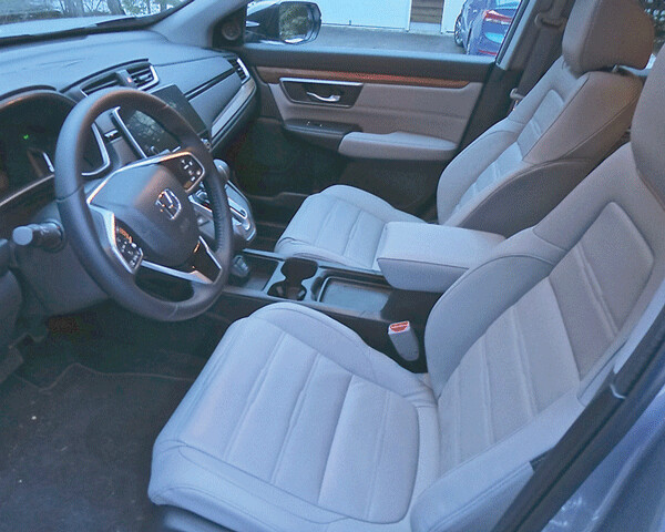 Luxurious leather lines the interior buckets to make the CR-V more pleasant to live in. Photo credit: John Gilbert