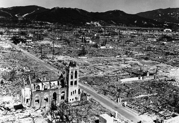 Hiroshima, August 1945, was smashed and burned by a bomb 20 times smaller than the smallest H-bomb in today’s US nuclear arsenal. 