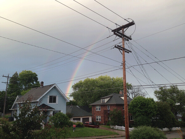 A second rainbow on the left is fading. Photo credit: Sam Black
