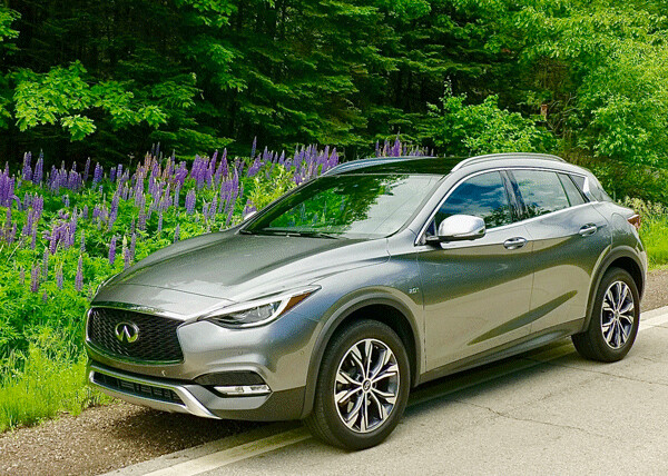 Infiniti QX30 strikes a low and sporty pose for a quick, over-30-mpg all-wheel drive compact SUV. Photo credit: John Gilbert