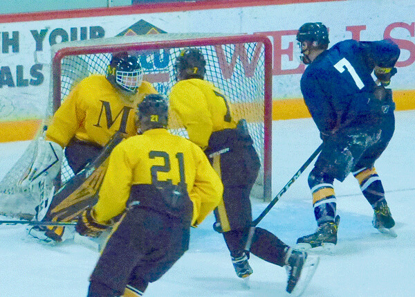 Hermantown’s Jake Herter was at the goal awaiting a final chance as Marshall held on to win the Lakeview Summer Classic 4-3. Photo credit: John Gilbert