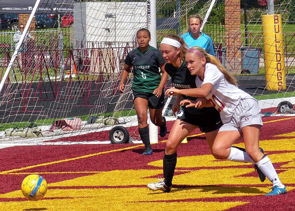 UMD's Lizzy Fontes battled for a loose ball against Wisconsin-Parkside. Photo credit: John Gilbert