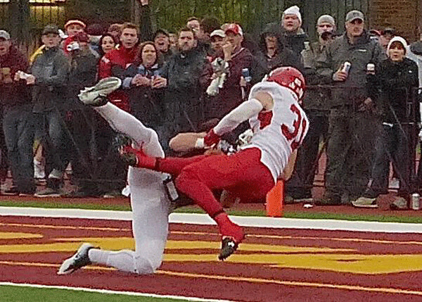 Sometimes the TD pass attempts were incomplete, leading to this bit of end zone ballet. Photo credit: John Gilbert