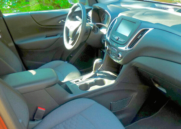 Equinox interior features supportive seats, all high-tech assets. Photo credit: John Gilber