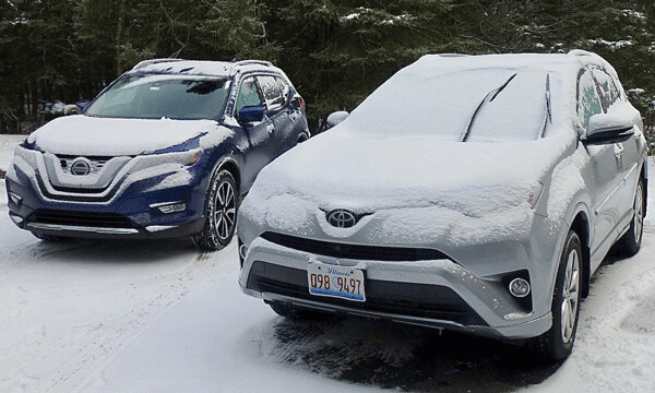 A little snow was nothing for the Nissan Rogue SL, left, or the Toyota RAV4. Photo credit: John Gilbert
