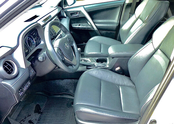 Supportive leather seats in the RAV4 make distance driving pleasant. Photo credit: John Gilbert