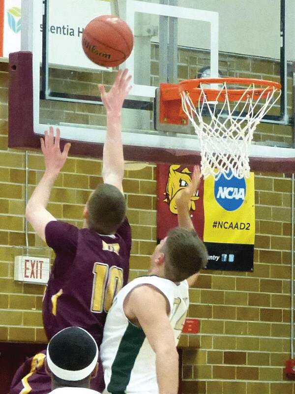 UMD sophomore Brandon Myer (10), from Superior, went up for two of his game-leading 21 points in a 62-57 victory over Bemidji State. Photo credit: John Gilbert