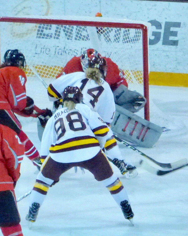 UMD's Sydney Brodt raced in ahead of linemate Katerina Mrazova (98) to score for a 3-1 lead over Ohio State. Photo credit: John Gilbert