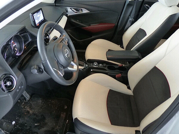 The smooth and simple interior has quality material and eergonomic controls. Photo credit: John Gilbert