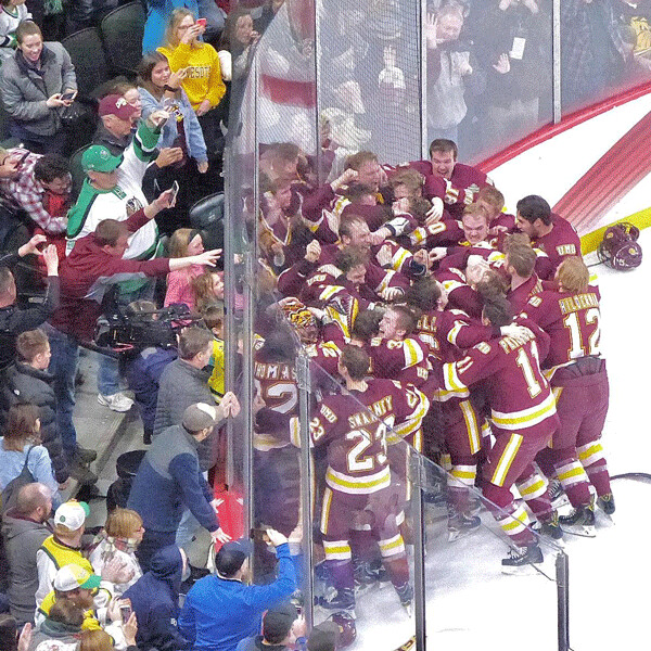 Bulldogs poured across the Excel Energy Center rink to celebrate.  Photo credit: John Gilbert