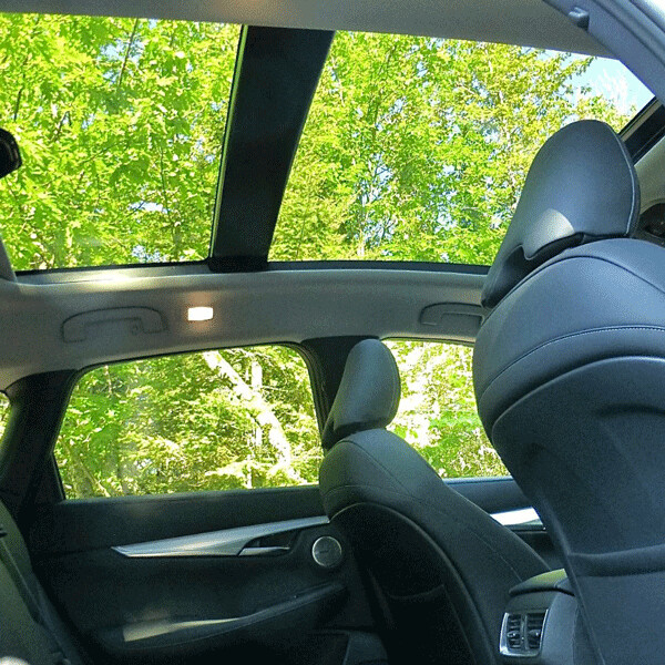 Panoramic sunroof stretches to cover front and rear seats. Photo credit: John Gilbert