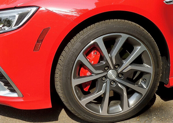 Stylish wheels show off bright red Brembo brakes. Photo by: John Gilbert