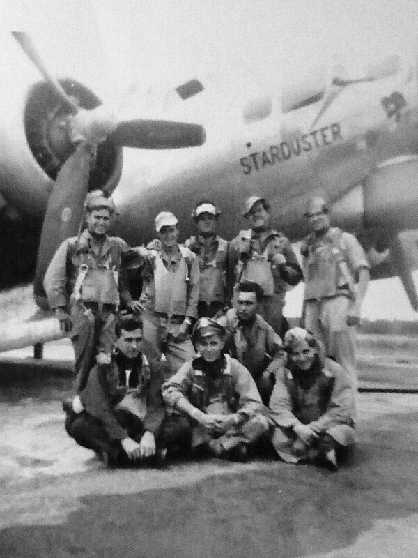 Roger Rand, age 20, posed in the middle of the front row with his B-17 crew in 1944, which,  he said, flew “22 1/2 missions” in World War II.