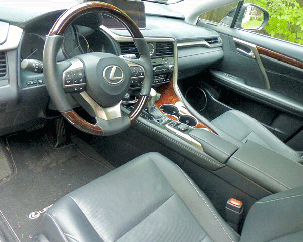 Lexus RX350-L interior luxury coated in leather, wood. Photo credit: John Gilbert