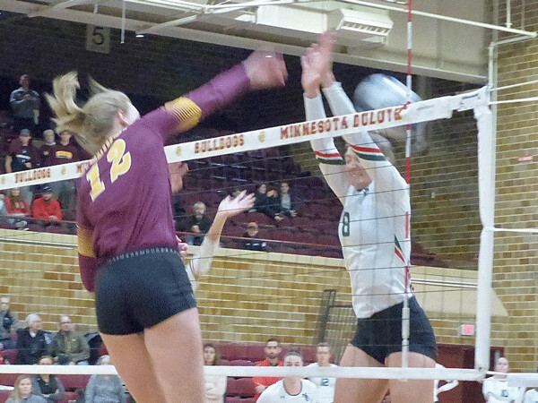 Hanna Meyer’s 12 kills helped UMD’s sweep of Minot State Saturday for a share of the NSIC title. Photo credit: John Gilbert