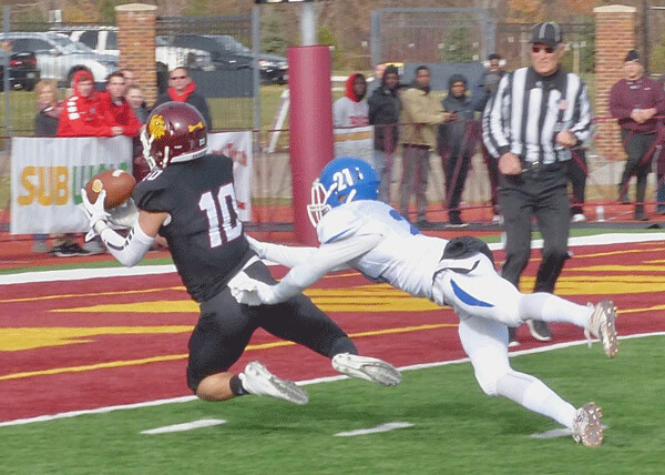 Johnny McCormick made a spectacular diving catch of a 37-yard pass from Mike Rybarczyk, one of two touchdowns McCormick scored in the 55-0 rout of Mary. Photo credit: John Gilbert