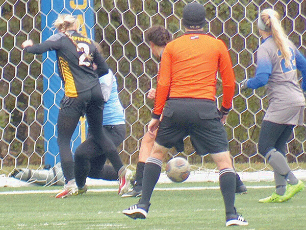 UWS junior Sarah Fjeran and St. Scholastica goalkeeper Roni Rudolph scrapped for a loose ball, which was inadvertently knocked in by a CSS defender for a last-minute goal and a 1-0 UMAC semifinal victory - the first time UWS has beaten the Saints.