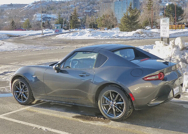 MX-5 Miata can be bought with 18 percent more power, retractable hardtop for warm security. Photo credit: John Gilbert