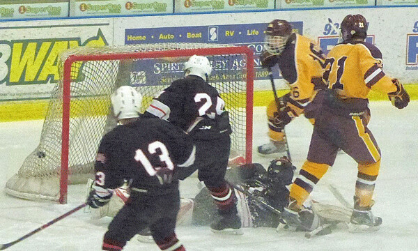 In the 7A quarterfinal, Nick Mattila's third goal hit the net and his hat trick led Denfeld to a 9-0 victory over Ely at Essentia-Heritage Center. Photo credit: John Gilbert