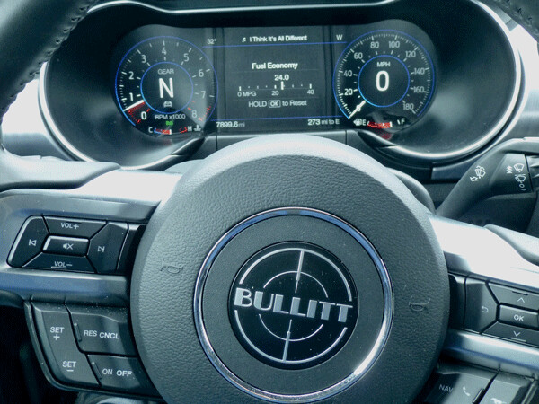 Steering wheel has an assortment of switches, outlining the efficient Bullitt  instruments. Photo credit: John Gilbert