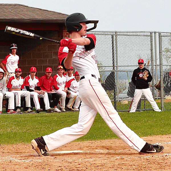 Caden Edwards smacked one of his three hits against Forest Lake at Ordean Field.  Photo credit: John Gilbert
