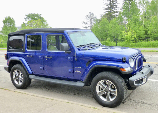 The 2019 Jeep Wrangler Unlimited Sahara in a deep blue that seems to have defied FCA’s name brigade. Photo credit: John Gilbert