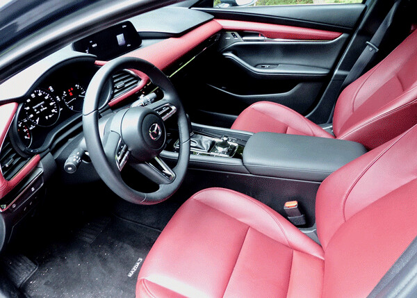 Red leather seats were tastefully blended into the redone interior. Photo credit: John Gilbert
