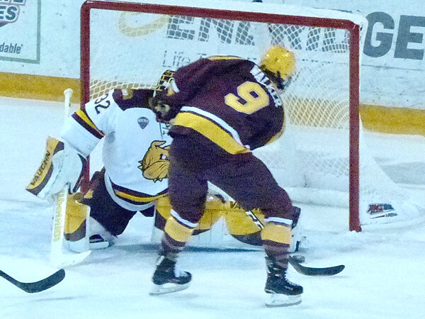 UMD goaltender Hunter Shepard returned to his usual groove, stopping Gopher star Sammy Walker on a first-period breakaway in Saturday's 2-0 shutout. Photo credit: John Gilbert