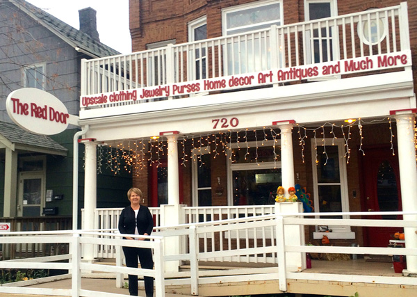 Sharon Kangas in front of her store, The Red Door, located at 720 East 4th Street in Duluth.  Photo Carol George