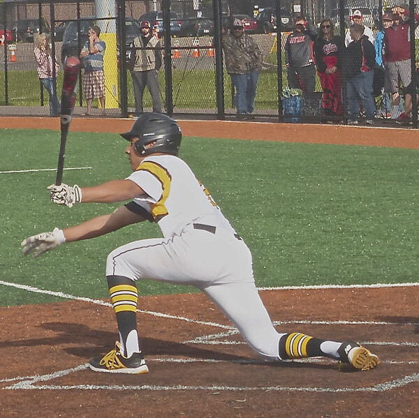 Junior Derrick Winn, who plays third base when not pitching, came up with a big blow in the seventh inning to allow Marshall to come from behind and defeat unbeaten St. Cloud Tech 8-4 in the state Class A tournament quarterfinals. Photo credit: John Gilbert