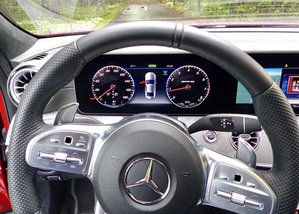 Sports steering wheel is AMG design, with large, easily reached shift paddles  located at thumb’s reach. Photo credit: John Gilbert