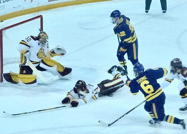 Parker Tuomie (6) fired a shot that whizzed past UMD goalie Hunter Shepard's glove to give Mankato a 2-0 lead in Friday's 4-1 first game. Photo credit: John Gilbert