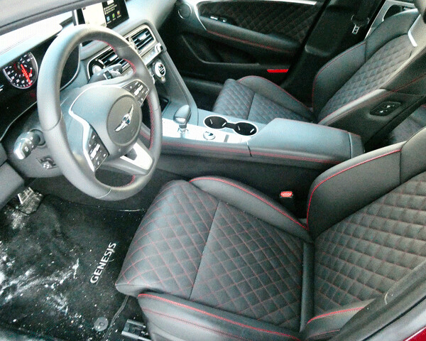 Top G70 has quilted leather seats in a feature-filled interior. Photo Credit: John Gilbert