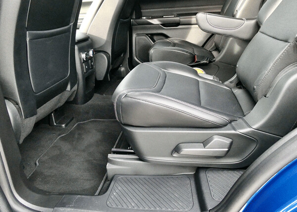 Rear bucket seats show switchwork that can easily slide or tilt the second-row buckets out of the way for third row access. Photo credit: John Gilbert