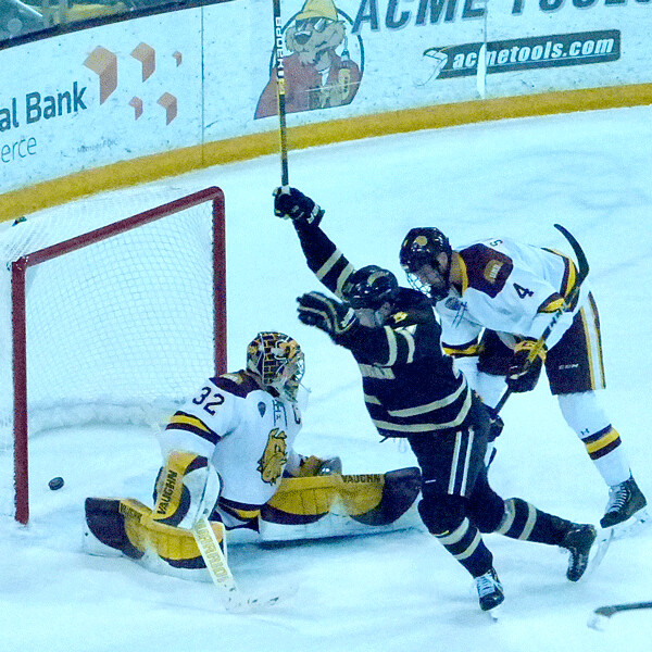 Hayward's Josh Passolt came "home" to torment UMD with his first of two goals in Saturday's 3-3 tie for Western Michigan, as a glancing shot went in off his skate. Photo credit: John Gilbert