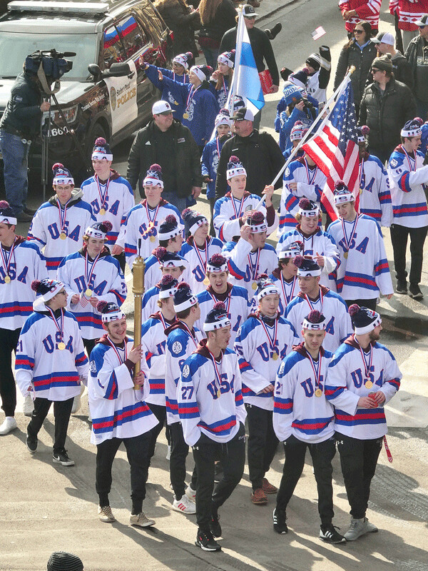 Player parade included replicas of 1980 Olympic teams. Photo credit: John Gilbert
